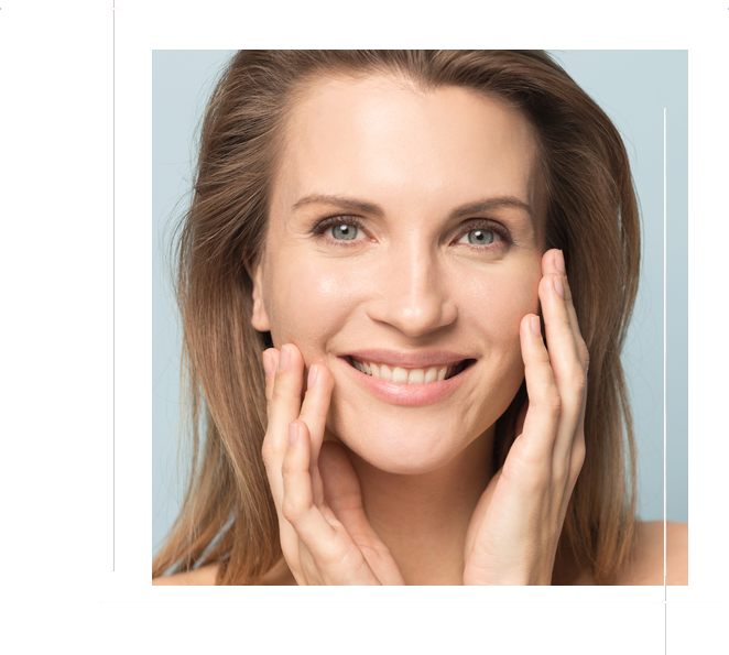 Head shot portrait smiling woman touching perfect smooth face skin