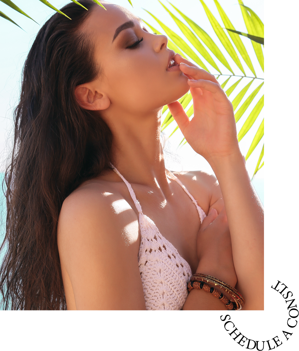 beautiful girl with dark hair in elegant beach clothes relaxing in tropical Bali island
