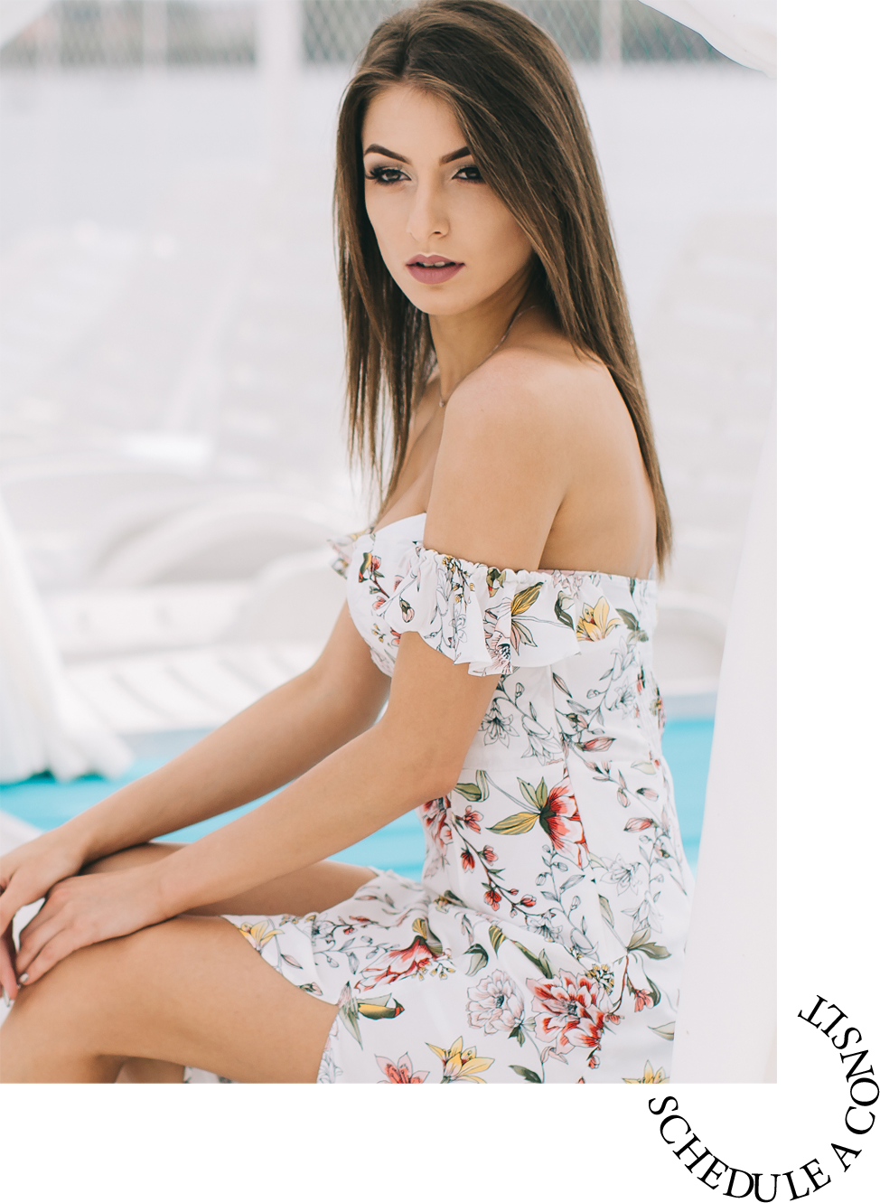 Portrait of a beautiful woman in a dress posing on a white wooden beach of summer.