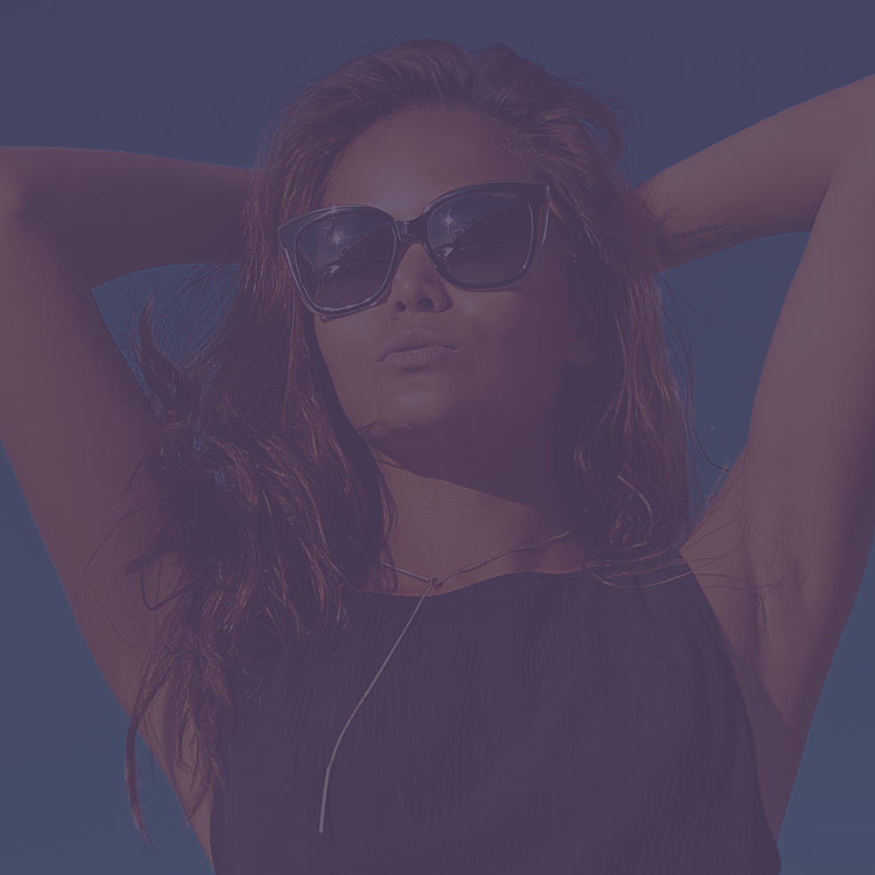 Beautiful brunette woman in sunglasses outdoor portrait